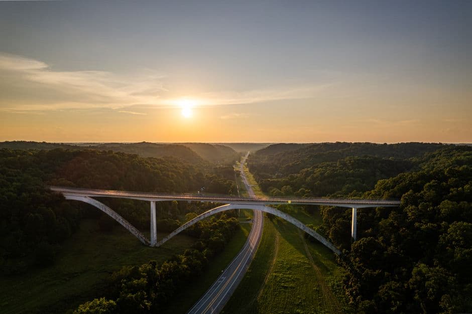 Stunning aerial shot of Natchez Trace Bridge in Nashville with a captivating sunset view.
